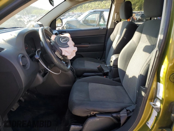 2012 Jeep Compass Latitude with VIN 1C4NJDEB6CD630669, listed as a Copart auction lot 52028235 with 124,123 mi miles and Salvage Title. Bid and sale history available at DreamBid. Image 7.