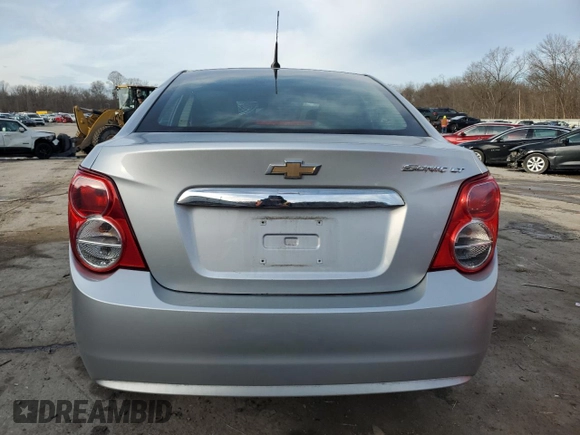 2012 Chevrolet Sonic LT with VIN 1G1JD5SH0C4231267, listed as a Copart auction lot 82848544 with 115,159 mi miles and Salvage title. Bid and sale history available at DreamBid. Image 6.