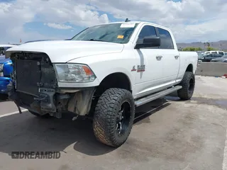 2017 Ram 2500 SLT with VIN 3C6UR5DL8HG551588, listed as a IAAI auction lot 42216223 with 125,891 mi miles and . Bid and sale history available at DreamBid. Image 2.