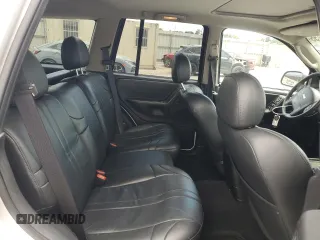 2004 Jeep Grand Cherokee Laredo z VIN 1J4GX48N94C386031, wystawiony jako Copart lot #55804755 z przebiegiem 160 103 mil mil oraz Szkoda całkowita • Salvage title. Historia ofert i sprzedaży dostępna na DreamBid. Obrazek 11.