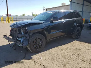 2021 Jeep Grand Cherokee Laredo X with VIN 1C4RJEAG0MC860983, listed as a Copart auction lot 57153715 with 59,697 mi miles and Clean title. Bid and sale history available at DreamBid. Image 1.