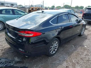 2017 Ford Fusion SE with VIN 3FA6P0HDXHR405345, listed as a IAAI auction lot 42462183 with 149,185 mi miles and . Bid and sale history available at DreamBid. Image 4.