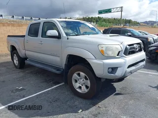 2012 Toyota Tacoma PreRunner with VIN 3TMKU4HN6CM033123, listed as a IAAI auction lot 41478582 with 89,479 mi miles and . Bid and sale history available at DreamBid. Image 1.