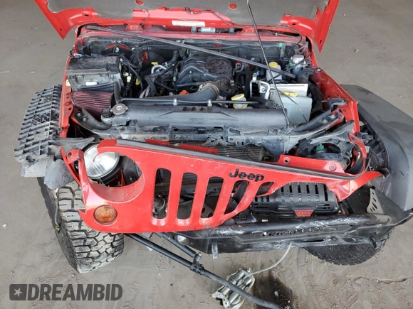 2012 Jeep Wrangler Unlimited Call of Duty MW3 with VIN 1C4BJWFGXCL225459, listed as a Copart auction lot 60699895 with 98,196 mi miles and Salvage title. Bid and sale history available at DreamBid. Image 11.