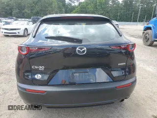 2023 Mazda CX-30 S with VIN 3MVDMBAM6PM513651, listed as a Copart auction lot 57432955 with 49,851 mi miles and Salvage title. Bid and sale history available at DreamBid. Image 6.