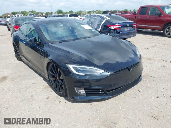 2017 Tesla Model S 100D z VIN 5YJSA1E45HF198921, wystawiony jako IAAI lot #42378026 z przebiegiem 104 967 mil mil oraz . Historia ofert i sprzedaży dostępna na DreamBid. Obrazek 1.