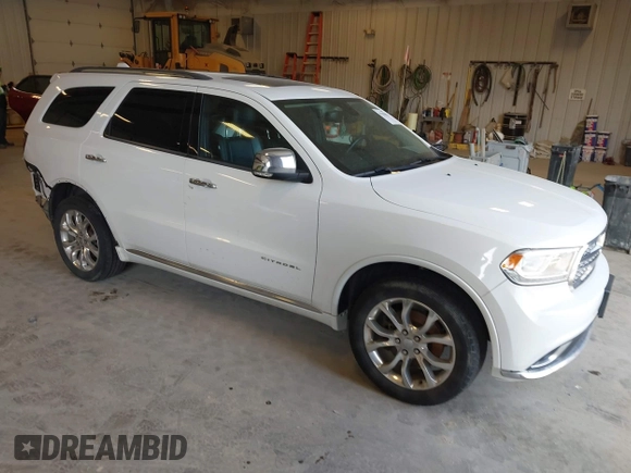 2016 Dodge Durango Citadel with VIN 1C4RDJEG9GC371805, listed as a IAAI auction lot 42135988 with 122,924 mi miles and . Bid and sale history available at DreamBid. Image 1.