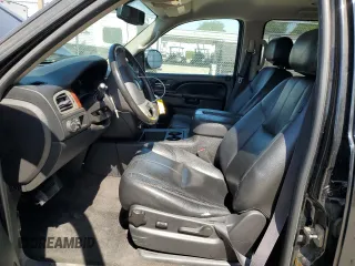 2014 Chevrolet Tahoe LT with VIN 1GNSCBE07ER115998, listed as a Copart auction lot 59577485 with 154,486 mi miles and Salvage title. Bid and sale history available at DreamBid. Image 7.