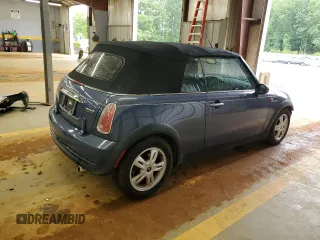 2005 MINI Convertible with VIN WMWRF33485TG10496, listed as a Copart auction lot 58582955 with 107,641 mi miles and Salvage title. Bid and sale history available at DreamBid. Image 3.