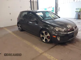 2012 Volkswagen GTI w/Sunroof & Navi PZEV z VIN WVWGD7AJ2CW100248, wystawiony jako IAAI lot #41905190 z przebiegiem 106 489 mil mil oraz . Historia ofert i sprzedaży dostępna na DreamBid. Obrazek 1.
