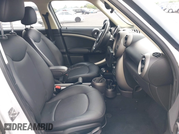 2012 MINI Countryman with VIN WMWZB3C57CWM04258, listed as a IAAI auction lot 42116867 with 168,550 mi miles and . Bid and sale history available at DreamBid. Image 5.