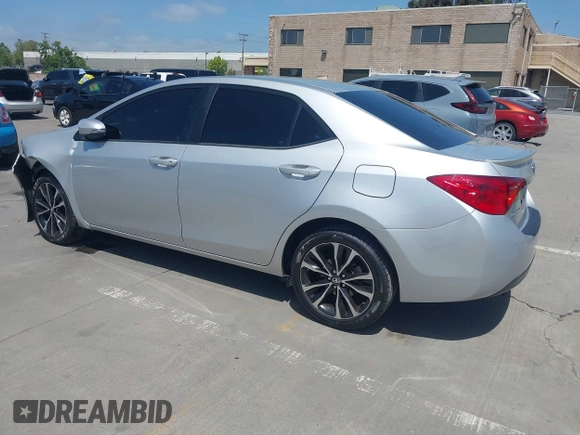 2019 Toyota Corolla L with VIN 5YFBURHE5KP877691, listed as a IAAI auction lot 42108591 with 85,813 mi miles and . Bid and sale history available at DreamBid. Image 3.