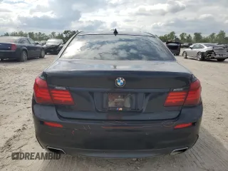 2015 BMW 7 Series 750i with VIN WBAYA8C59FG197642, listed as a Copart auction lot 70282884 with 130,853 mi miles and Salvage title. Bid and sale history available at DreamBid. Image 6.