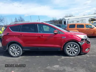 2017 Ford Escape Titanium with VIN 1FMCU0JD9HUC71738, listed as a IAAI auction lot 41673228 with 173,615 mi miles. Bid and sale history available at carsss.com. Image 13.
