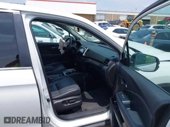 2020 Honda Ridgeline RTL with VIN 5FPYK3F51LB029859, listed as a IAAI auction lot 42462285 with 57,399 mi miles and . Bid and sale history available at DreamBid. Image 5.