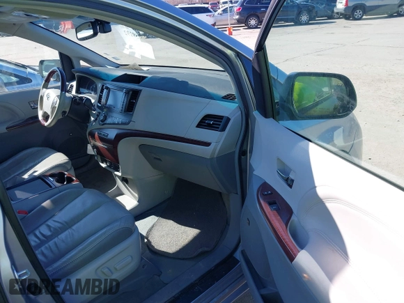 2011 Toyota Sienna XLE AAS with VIN 5TDYK3DC6BS147636, listed as a IAAI auction lot 41759192 with 182,966 mi miles and . Bid and sale history available at DreamBid. Image 5.