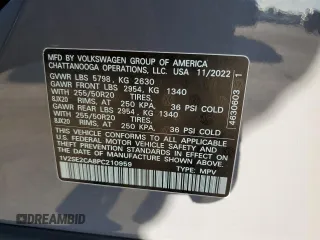 2023 Volkswagen Atlas SEL z VIN 1V2SE2CA8PC210959, wystawiony jako Copart lot #73726564 z przebiegiem 27 799 mil mil oraz Szkoda całkowita • Salvage title. Historia ofert i sprzedaży dostępna na DreamBid. Obrazek 14.