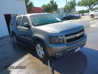 2007 Chevrolet Suburban LTZ with VIN 3GNFC16087G242868, listed as a IAAI auction lot 41872386 with 203,525 mi miles. Bid and sale history available at carsss.com. Image 1.