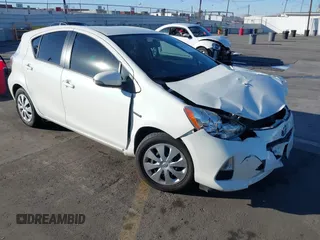 2014 Toyota Prius One with VIN JTDKDTB38E1575308, listed as a IAAI auction lot 40787857 with 70,891 mi miles and . Bid and sale history available at DreamBid. Image 1.
