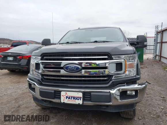 2018 Ford F-150 XL with VIN 1FTEW1EB0JKD85702, listed as a IAAI auction lot 41207356 with 136,528 mi miles. Bid and sale history available at carsss.com. Image 11.