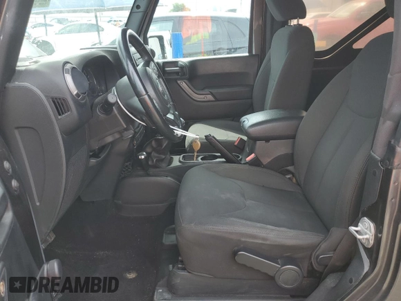 2018 Jeep Wrangler Sport S with VIN 1C4AJWAG7JL916447, listed as a Copart auction lot 55484475 with 55,136 mi miles and Salvage title. Bid and sale history available at DreamBid. Image 7.