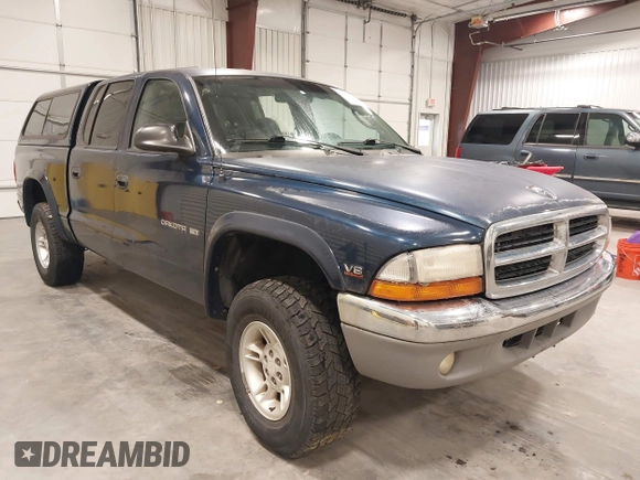 2000 Dodge Dakota Sport with VIN 1B7GG2AN6YS636308, listed as a IAAI auction lot 42405180 with 171,266 mi miles and . Bid and sale history available at DreamBid. Image 1.