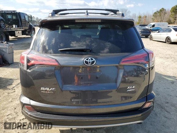 2018 Toyota RAV4 XLE with VIN 2T3RFREV3JW848384, listed as a Copart auction lot 88758945 with 28,951 mi miles and Salvage Title. Bid and sale history available at DreamBid. Image 6.