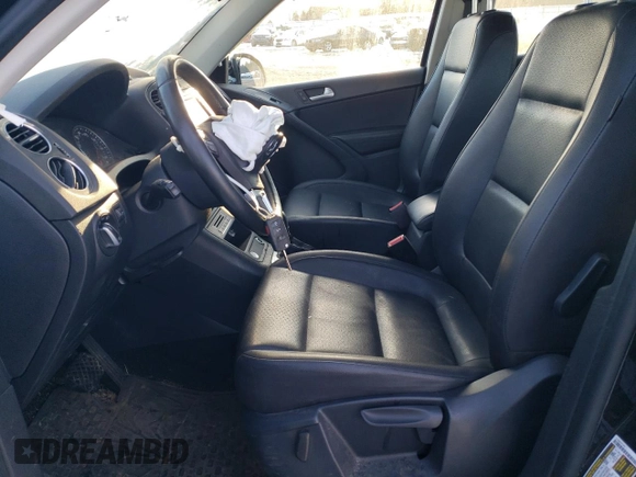 2017 Volkswagen Tiguan S with VIN WVGAV7AX8HK028148, listed as a Copart auction lot 86756104 with 84,060 mi miles and Salvage Title. Bid and sale history available at DreamBid. Image 7.