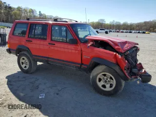 1995 Jeep Cherokee Sport with VIN 1J4FJ68S2SL666126, listed as a Copart auction lot 50496735 with 158,523 mi miles and Salvage title. Bid and sale history available at DreamBid. Image 4.