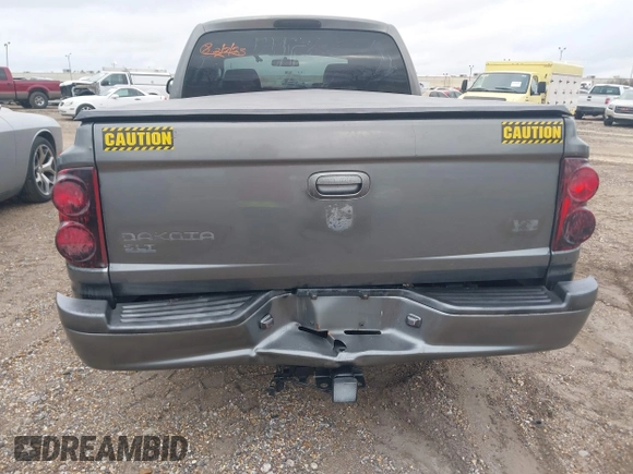 2005 Dodge Dakota SLT with VIN 1D7HE48N05S293699, listed as a IAAI auction lot 41541498 with 166,159 mi miles and . Bid and sale history available at carsss.com. Image 6.