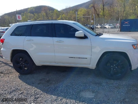 2015 Jeep Grand Cherokee Altitude with VIN 1C4RJFAG1FC797157, listed as a IAAI auction lot 42021139 with 148,491 mi miles. Bid and sale history available at carsss.com. Image 13.