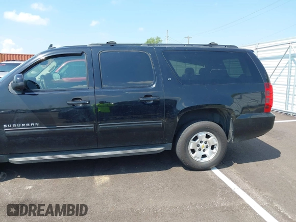 2011 Chevrolet Suburban LT with VIN 1GNSKJE34BR151246, listed as a IAAI auction lot 42520210 with 239,240 mi miles and . Bid and sale history available at DreamBid. Image 3.