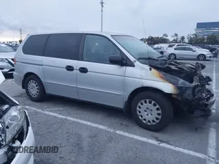 2002 Honda Odyssey LX z VIN 5FNRL18542B028358, wystawiony jako IAAI lot #41799092 z przebiegiem Nie podano mil oraz . Historia ofert i sprzedaży dostępna na DreamBid. Obrazek 14.
