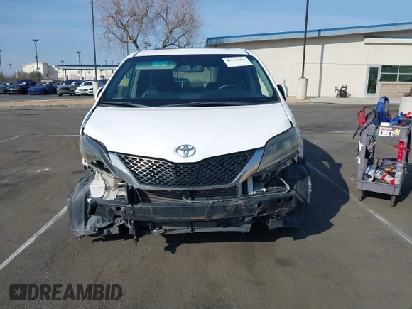 2015 Toyota Sienna SE with VIN 5TDXK3DC6FS627578, listed as a IAAI auction lot 41568684 with 124,138 mi miles and . Bid and sale history available at DreamBid. Image 12.