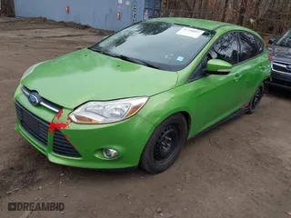 2012 Ford Focus SE with VIN 1FAHP3K26CL125074, listed as a IAAI auction lot 41790997 with 156,993 mi miles. Bid and sale history available at carsss.com. Image 2.