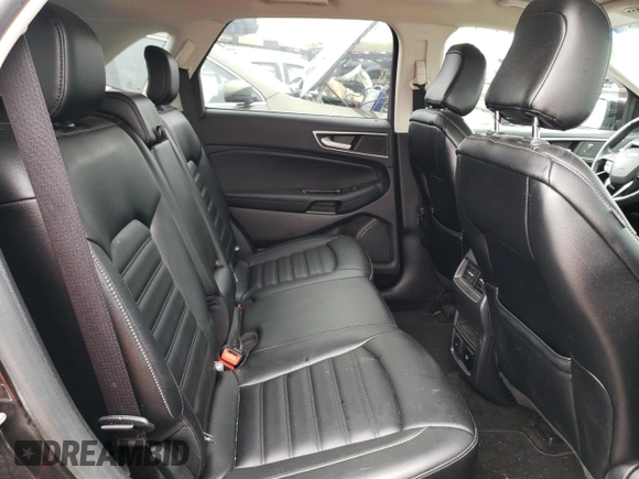 2020 Ford Edge SEL с VIN 2FMPK4J90LBA34676, выставлен на аукционе Copart как лот 55577665 с пробегом 113 214 миль миль и Списание • Salvage title. История ставок и продаж доступна на DreamBid. Изображение 11.