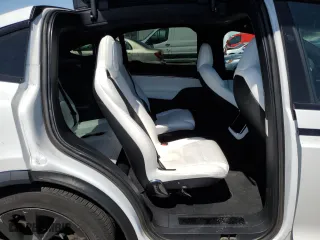 2022 Tesla Model X with VIN 7SAXCBE50NF331632, listed as a Copart auction lot 48062053 with 0 mi miles. Bid and sale history available at carsss.com. Image 10.