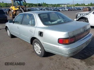 1994 Toyota Camry LE z VIN JT2SK12E0R0209312, wystawiony jako IAAI lot #42197159 z przebiegiem 270 657 mil mil oraz . Historia ofert i sprzedaży dostępna na DreamBid. Obrazek 3.