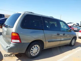 2000 Ford Windstar LX z VIN 2FMZA5145YBA12427, wystawiony jako IAAI lot #41990471 z przebiegiem 97 069 mil mil oraz . Historia ofert i sprzedaży dostępna na DreamBid. Obrazek 13.