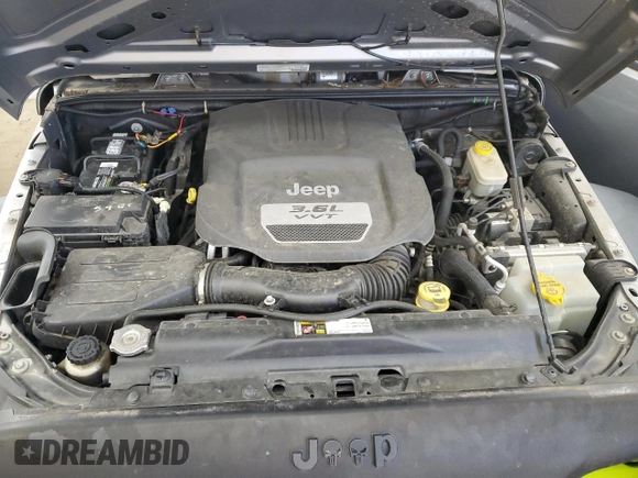 2013 Jeep Wrangler Sport with VIN 1C4AJWAG5DL591897, listed as a Copart auction lot 63218025 with 81,250 mi miles and Clean title. Bid and sale history available at DreamBid. Image 11.