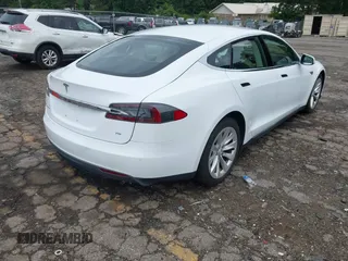 2016 Tesla Model S 70 with VIN 5YJSA1E11GF132984, listed as a IAAI auction lot 42428634 with Not provided miles and . Bid and sale history available at DreamBid. Image 4.