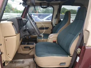 2001 Jeep Wrangler Sahara z VIN 1J4FA59SX1P305100, wystawiony jako Copart lot #58606685 z przebiegiem 76 856 mil mil oraz Czysty tytuł • Clean title. Historia ofert i sprzedaży dostępna na DreamBid. Obrazek 7.