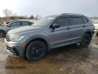 2022 Volkswagen Tiguan SE R-Line Black with VIN 3VV8B7AXXNM106110, listed as a Copart auction lot 43039575 with 24,728 mi miles and Salvage Title. Bid and sale history available at DreamBid. Image 1.