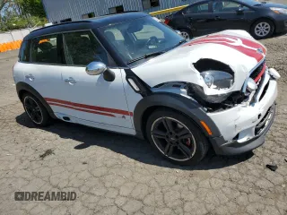 2015 MINI Countryman John Cooper Works with VIN WMWXD1C58FWS34860, listed as a Copart auction lot 55384065 with 48,709 mi miles and Salvage Title. Bid and sale history available at DreamBid. Image 4.