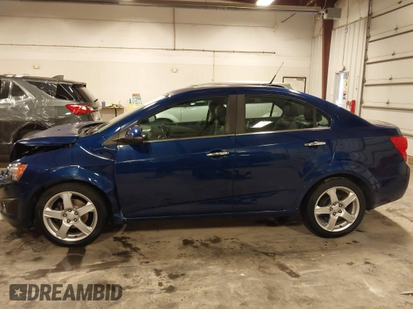 2012 Chevrolet Sonic LTZ z VIN 1G1JE5SB4C4214450, wystawiony jako IAAI lot #42207345 z przebiegiem 120 152 mil mil oraz . Historia ofert i sprzedaży dostępna na DreamBid. Obrazek 15.