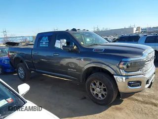 2021 Ram 2500 Laramie z VIN 3C6UR5FL7MG629012, wystawiony jako IAAI lot #41369353 z przebiegiem 168 099 mil mil oraz . Historia ofert i sprzedaży dostępna na DreamBid. Obrazek 13.