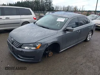 2013 Volkswagen Passat SE w/Sunroof & Nav with VIN 1VWBP7A33DC072530, listed as a IAAI auction lot 41906797 with 118,110 mi miles. Bid and sale history available at carsss.com. Image 2.