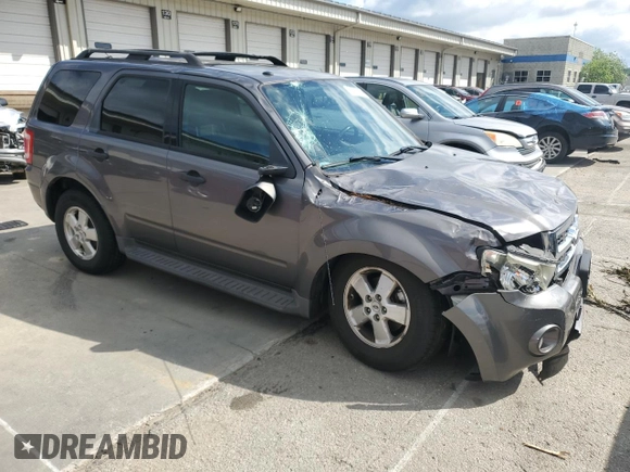 2011 Ford Escape XLT с VIN 1FMCU9DG8BKB02212, выставлен на аукционе Copart как лот 58200445 с пробегом 168 284 миль миль и Списание • Salvage title. История ставок и продаж доступна на DreamBid. Изображение 4.