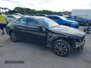2015 Mercedes-Benz C C 300 Luxury with VIN 55SWF4KB4FU000817, listed as a IAAI auction lot 41565974 with 102,223 mi miles. Bid and sale history available at carsss.com. Image 1.