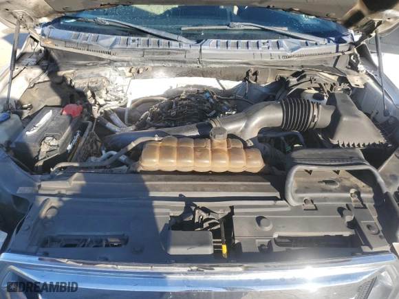 2015 Ford F-150 XLT w/HD Payload Pkg with VIN 1FTFW1EG1FKD03354, listed as a Copart auction lot 87190684 with 185,579 mi miles and Salvage Title. Bid and sale history available at carsss.com. Image 12.